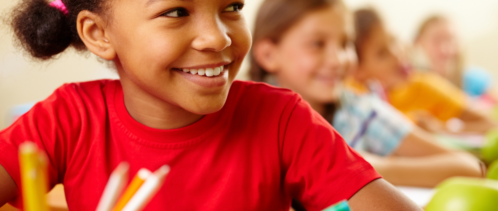 Girl using executive function skills to pay attention in class