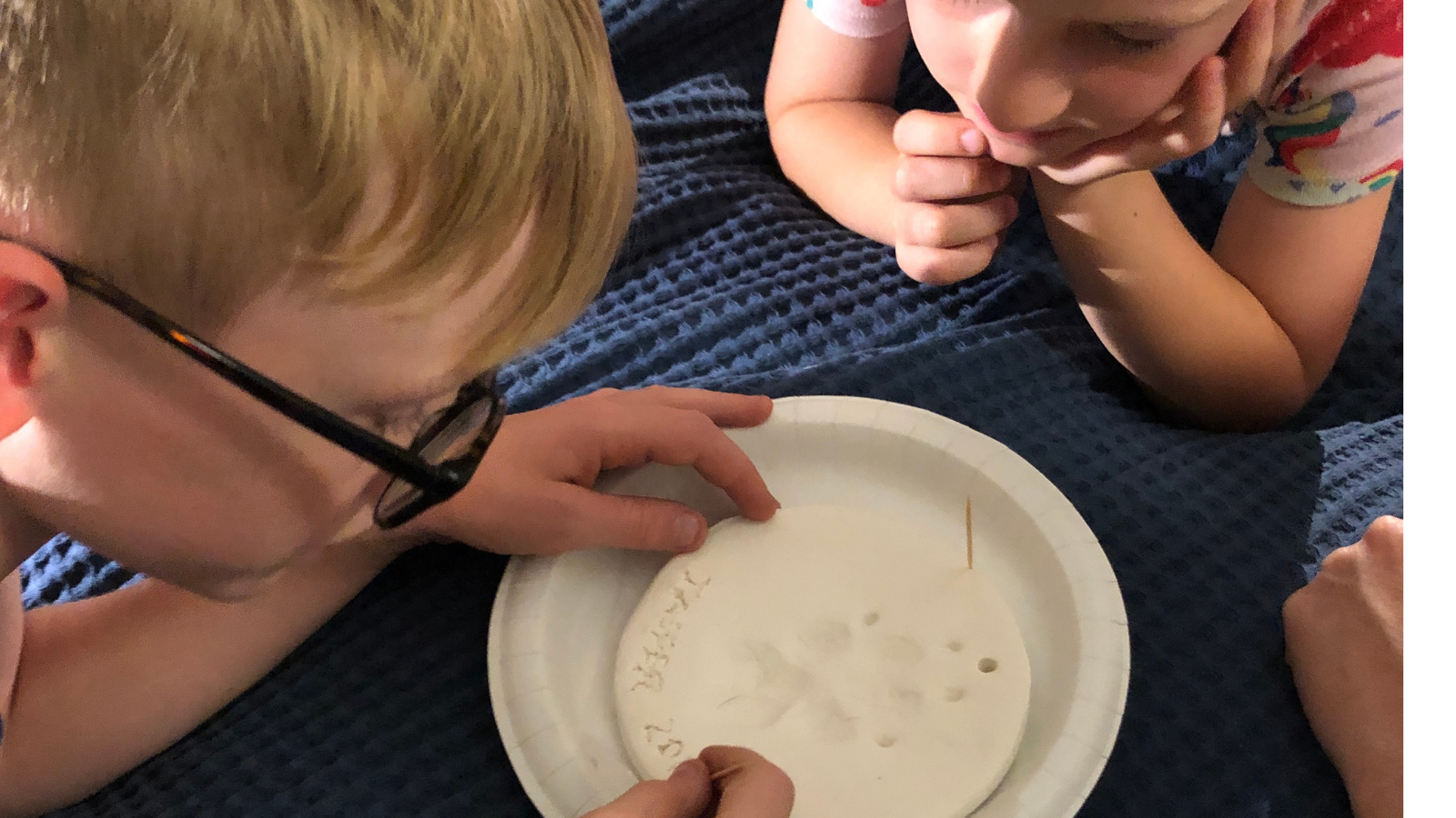 Children in grief making art after their dog died