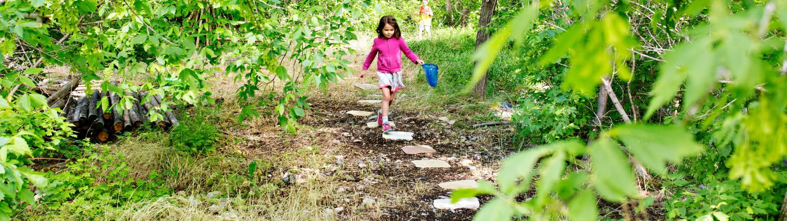 Kids walking on a path taking new habits one step at a time