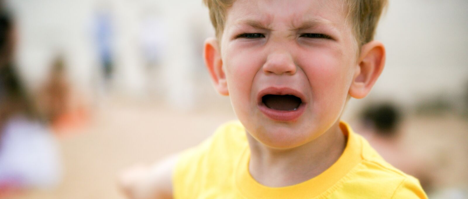 Child crying who needs an emotion coach to help handle his feelings