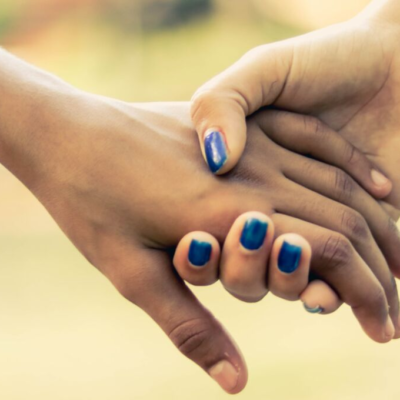 Teenage relationship holding hands