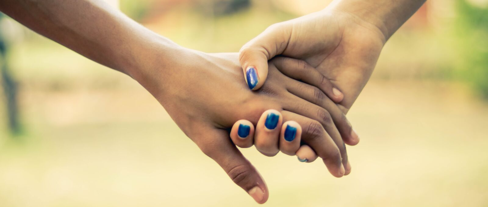 Teenage relationship holding hands