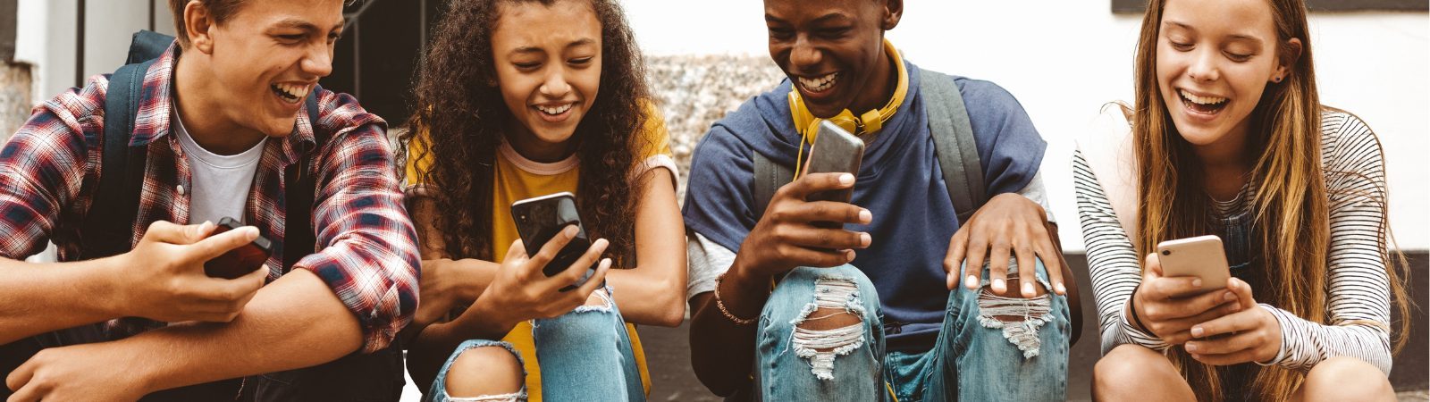 Teens on social media on their phones