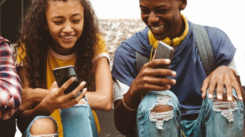 Teens on social media on their phones